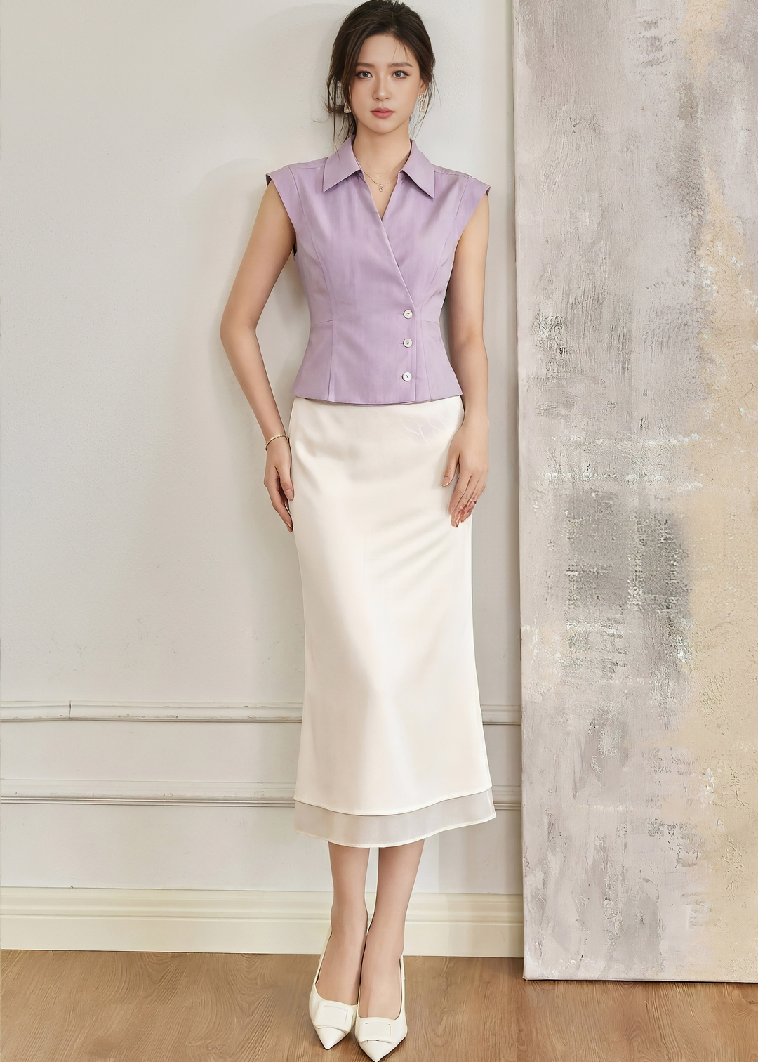 SLEEVELESS ASYMMETRIC WRAP BLOUSE